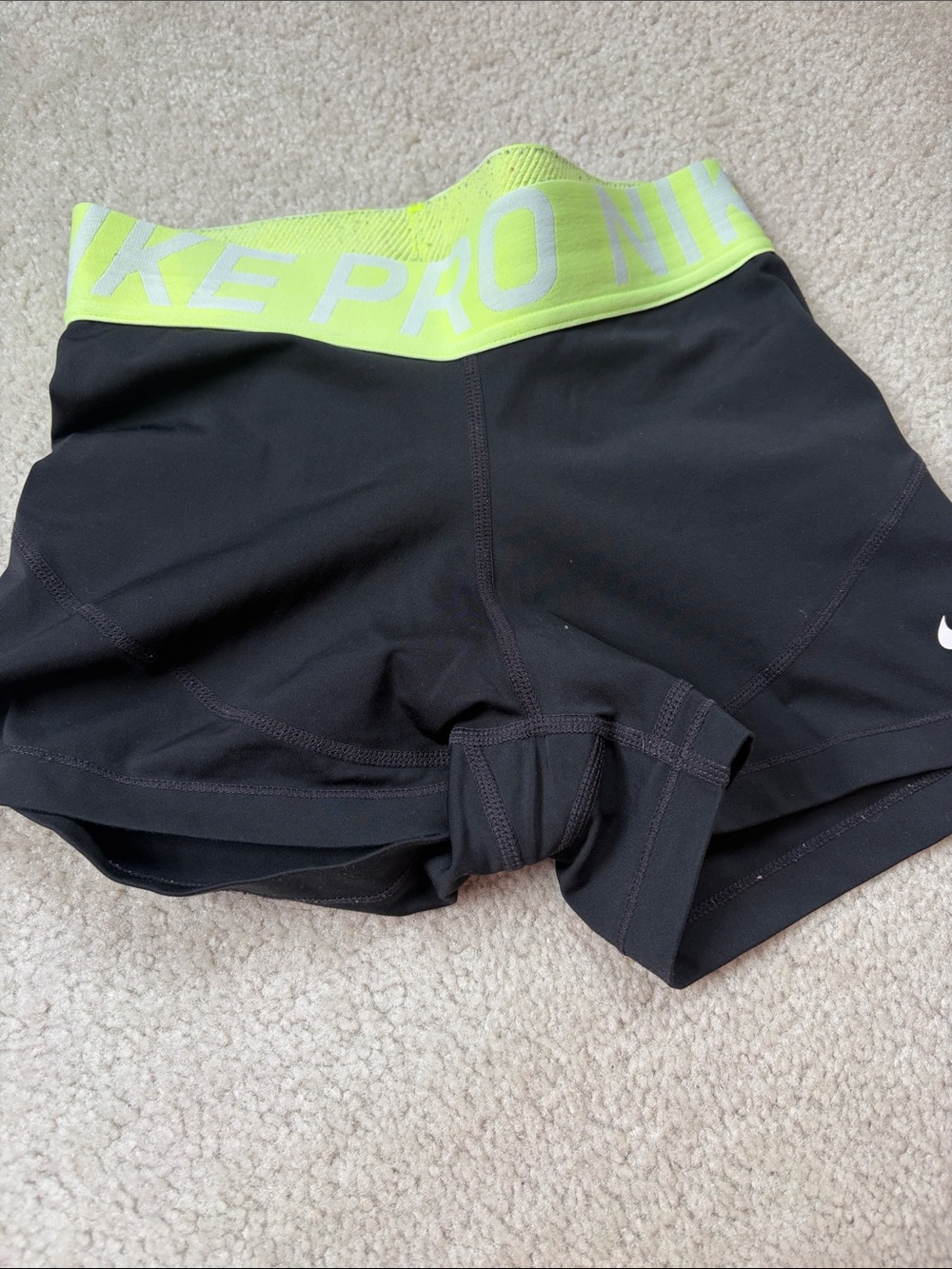 Nike Women's Black Athletic Shorts with Neon Yellow Waistband